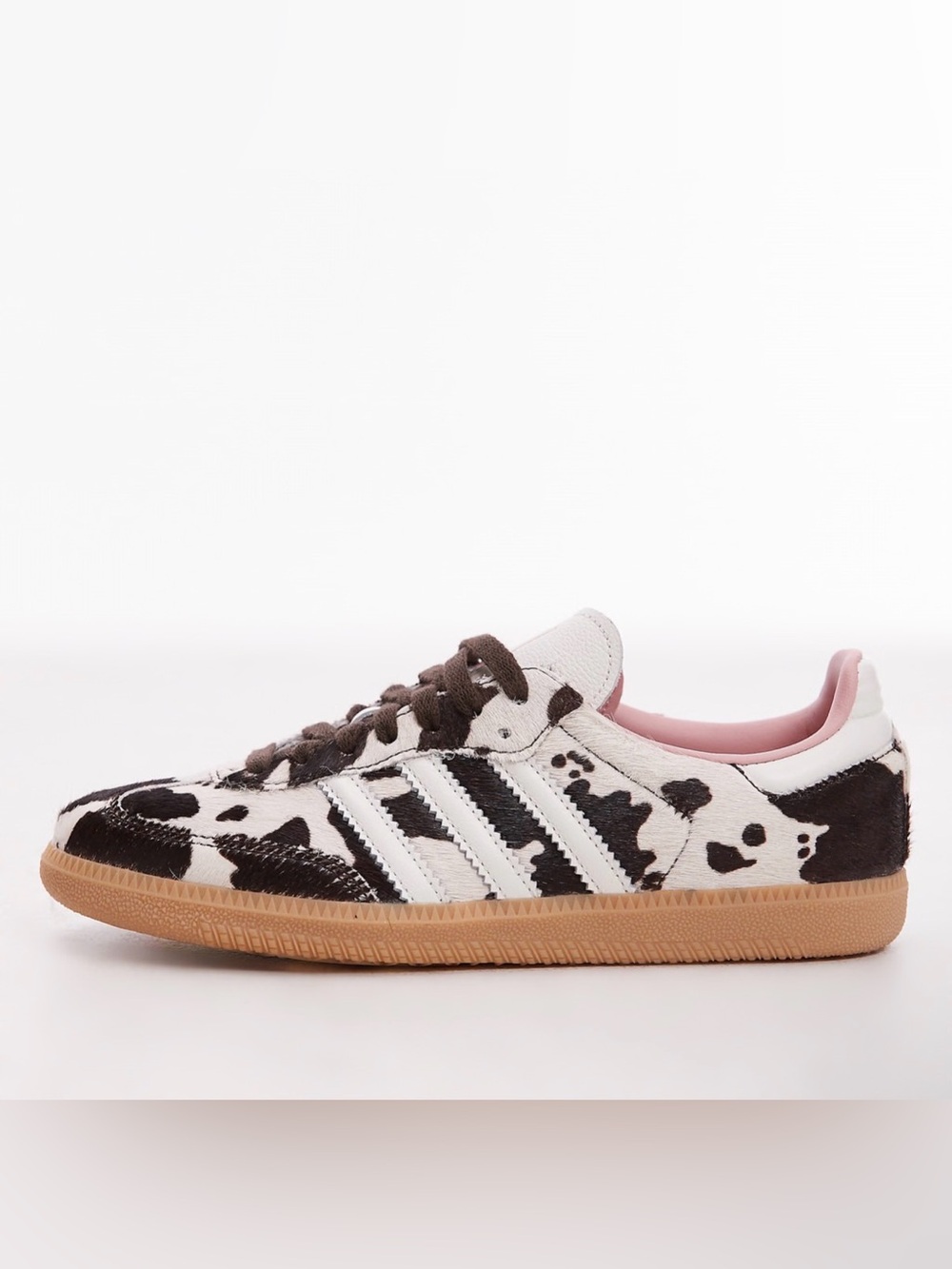 adidas women’s Samba Sneakers in Black & White Cow Print with Pink Lining